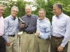 Ramsey Goodrich, Gary Mathias, Michael Carter, Frank Morse and Martin Magida mark the 25th anniversary of their investment banking firm in Southport.