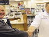 Provident banker Steve Drobysh with longtime customer Scott Mace, owner of Rock Hill Pharmacy.