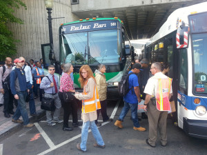 Commuters board buses at the Bridgeport Transportation Center May 21. Photo by John Miskulin, courtesy of Metro-North Railroad.