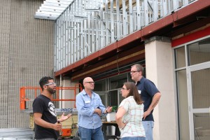 General Manager Doug Bowmen (second from left) shares his thoughts on the renovation project with Westchester County residents at the hard hat tour.