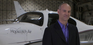 Andrew Schmertz, chief executive of Hopscotch Air, in front of a Cirrus airplane, which will fly customers from Westchester to Boston.