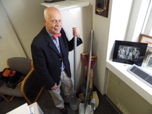 Tad Diesel with his collection of ceremonial groundbreaking shovels.