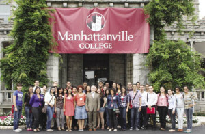 Nearly 40 new graduate business students from the Dominican Republic outside Manhattanville”™s historic Reid Castle with Anthony Davidson, dean of The School of Graduate and Professional Studies, center.