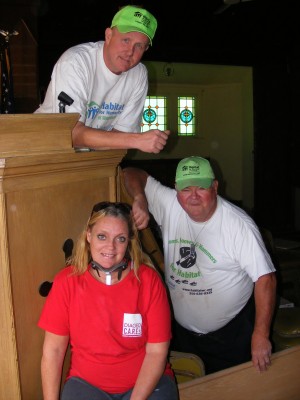 A Breezy Point church is Habitat for Humanity's operations center in the Rockaways. From left, Jim Killoran, executive director, and volunteers Stacy Walsh and Tom Naughton.