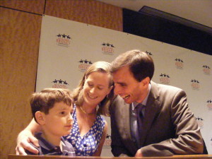 After the debate, Noam Bramson and wife Catie listen to a critique from son Jeremy.