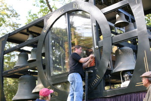 Jim Logan, superintendent of Sleepy Hollow Cemetery, unlocks the 5.5 ton chimes which will be showcased as a tourist attraction throughout the Halloween season.