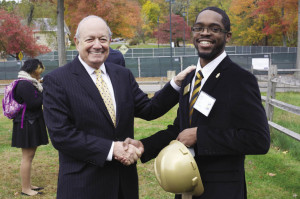 Pace President Stephen J. Friedman with Pace junior Qadry Harris.