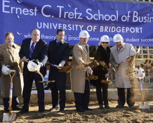 From left, University of Bridgeport Trustee Robert Berchem; U.B. President Neil Albert Salonen; Gov. Dannel P. Malloy; Ernest and  Mrs. Trefz; and U.B. Co-Chairman of the Board of Trustees Frank Zullo break ground on the newly renamed Ernest C. Trefz School of Business.