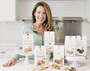 Sara Leand, CEO and owner of Sara Snacker Cookie Co., displays her line of cookies.