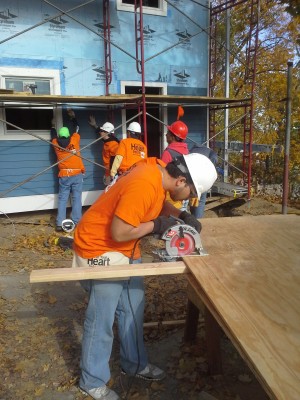 A Habitat for Humanity Westchester volunteer rebuilding a foreclosed home in Yonkers for ownership by military veterans.   
