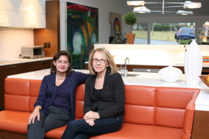 Architect Christina Griffin, left and real estate agent Geraldine Angel at Angel”™s sustainable home.