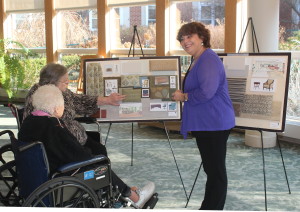 Lori Grossman, Small House Project Leader at Sarah Neuman Center, shares the decorative finishes used in the newly renovated Small Houses with two residents who will be moving in soon. Photo by Jewish Home Lifecarex.