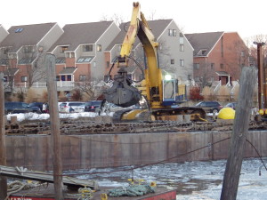 A Coastline Consulting and Development dredge at work in the west end of Cos Cob Marina.