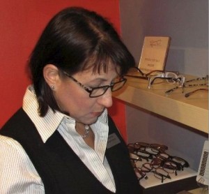 Renee Bachner examines some of the collection of her Renee”™s Readers eyeglass designs.