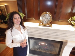 Dana Jevarjian beside the fire at Delamar Greenwich Harbor.