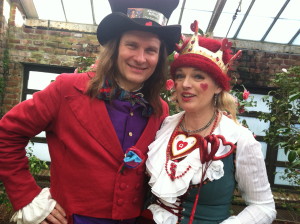 Cold Spring storyteller Jonathan Kruk is pictured as the Mad Hatter, while his wife, Andrea Sadler, portrays the Queen of Hearts in preparation for a post-Valentine”™s Day appearance.