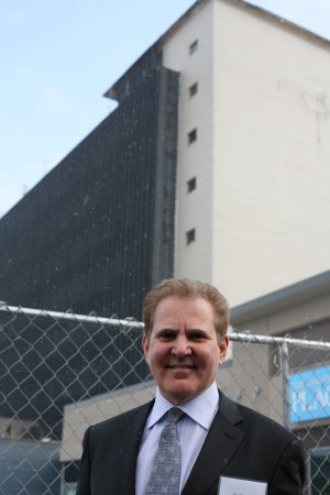 Co-developer James Friend outside the Cross County Shopping Center tower being retrofitted as a 155-room hotel. 