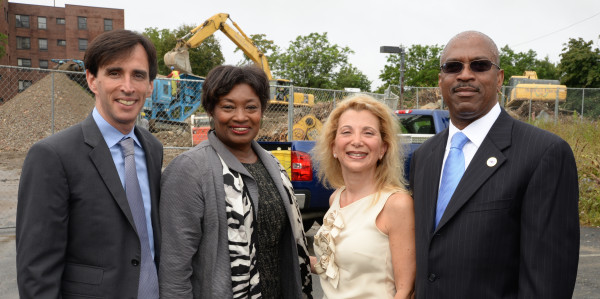 Shown at the groundbreaking ceremony for Heritage Homes are, from left,  New Rochelle Mayor Noam Bramson, state Sen. Andrea Stewart-Cousins, Rella Fogliano, president of MacQuesten Development L.L.C., and Steven Horton, executive director of the New Rochelle Municipal Housing Authority. Photo by John Vecchiolla