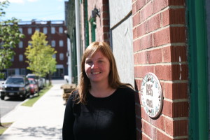 Madeline Fletcher outside her Newburgh Community Land Bank office.