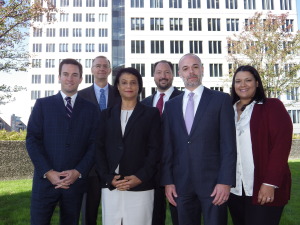 In front of 400 Atlantic St. in Stamford, owned by The Landis Group, are CBRE executives, from left front row, Kevin McCarthy, vice president; Khadija Kay Licata, director of research services; David Block, senior vice president and leasing agent for 400 Atlantic St.; and Johanna Clark Wendt, marketing and communications manager. In the back row are Executive Vice President Tom Pajolek, left, and Senior Managing Director Robert Caruso. Photo by Bill Fallon