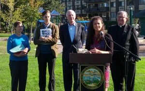 From left at Ellsworth Park in Bridgeport, Melissa Quan, director, Office of Service Learning, Fairfield University; Davey Ives, environmental projects coordinator, city of Bridgeport; Bridgeport Mayor Bill Finch; Dina Franceschi, professor of economics, Fairfield University; and Jeffrey von Arx, president, Fairfield University. Stamford University photo