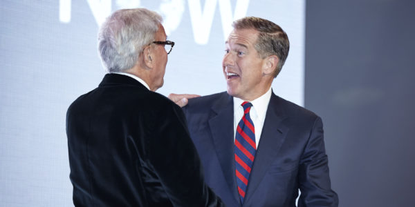 Tom Brokaw, former NBC News anchor, greets current NBC anchor Brian Williams at the Multiple Myeloma Research Foundation Fall Gala.