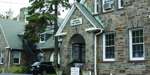 The entrance to the Purchase Free Library at the Purchase Community House.