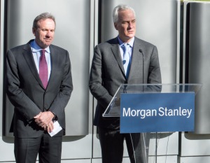Bill Kurtz of Bloom Energy looks on as Jim Rosenthal, chief operating officer of Morgan Stanley, speaks about the installation of a fuel cell energy server produced by Bloom Energy on Morgan Stanley”™s Westchester Avenue campus.