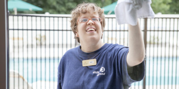 A participant in Ability Beyond”™s internship program at her job-training site, La Quinta Inn & Suites in Danbury.