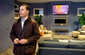 Ted Ferrarone, Building and Land Technology's chief operating officer, shows off a common area in the Vault Apartments in Stamford. Photo by Lindsay Perry