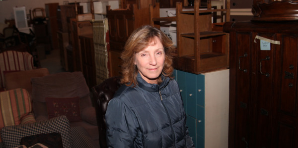 Kate Bialo inside the Furniture Sharehouse. Photo by John Golden