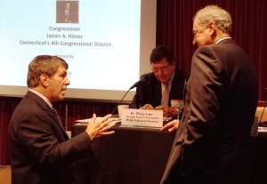 From left, Tom Gagliardi Jr., Guilford-based Thomas Industries; Philip Lane, associate professor of economics, Dolan School of Business, Fairfield University; and John Traynor, senior vice president and chief investment officer, Bridgeport-based People's United Bank.