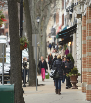 Shoppers walk along Greenwich Avenue. Photo by Tyler Sizemore