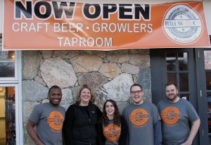 Brew & Co. employees at the shop's grand-opening, from left, Travis Johnson, Meg Burdick, Emily Carsten, Will Stickles and Zander McKernan. 