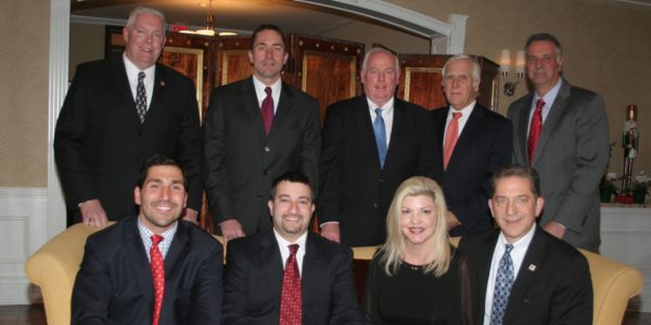 BOMA Westchester officers include, standing from left, Vinny Finnegan, immediate past president Bill Muzzio, William Bassett, Dean Bender and John Lomurno; and seated from left, Cameron Paktinat, Scott Tangredi, Susan Curtis and Paul Senecal.  