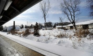 Officials in Bethe hope to move forward with plans to create a transit-oriented development surrounding Bethel's train station. Industrial buildings shown here next to the train station could be the future home of new retail and residential space. Photo by Carol Kaliff