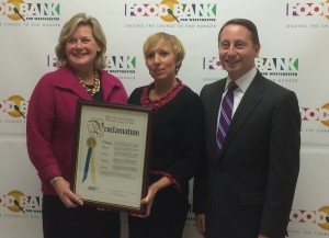 From left, Ellen Lynch, executive director of the Food Bank for Westchester; Jeanne Blum, Food Bank vice president of strategic partnerships and advocacy, and former executive director of the Westchester Coalition for the Hungry and Homeless; and Westchester County Executive Robert P. Astorino. Photo by Leif Skodnick