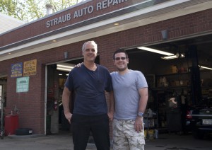 Harry Straub, left, at his Hastings-on-Hudson auto repair shop with son Thomas. The shop accepts bitcoins as a form of payment. File photo