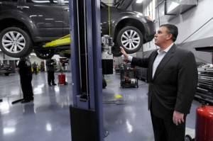 Colonial Subaru owner David Beylouni shows the service area in a newly constructed building for the dealership on Newtown Road in Danbury. Photo by Carol Kaliff