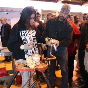 Sleepy Hollow High School senior Cindy Rodriguez is shown how to use a welding torch by Mike Sweeney, field trainer from Plumbers and Steamfitters Local 21 in Peekskill. Photo by John Golden