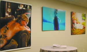 Some of the works on display at The Raw Beauty Project NYC photography exhibit. Photo by Colleen Wilson