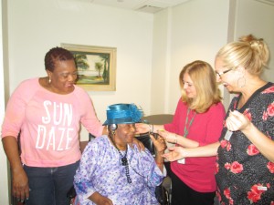 Witherell resident Cordella Shaw listens to personalized music recently. Photo courtesy The Witherell 