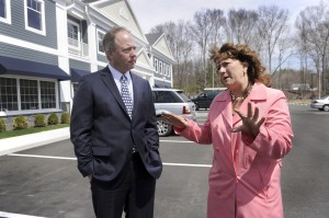 Local realtor Todd Payne, and Betsy Paynter, economic development coordinator for Newtown, talk about development in the area of Mt. Pleasant Road. Photo by Carol Kaliff