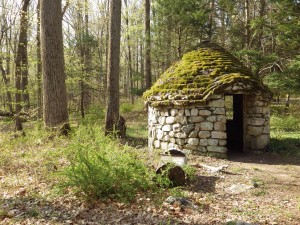 A stone hut in Cos Cob's forested Montgomery Pinetum Park.