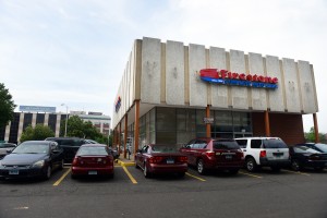 Firestone Complete Auto Care sits on the corner of Lafayette Circle and John Street in Bridgeport. Plans are in place to turn Lafayette Circle into a traditional street grid and increase development, but Firestone”™s store manager says the project would hurt his business. Photo by Autumn Driscoll