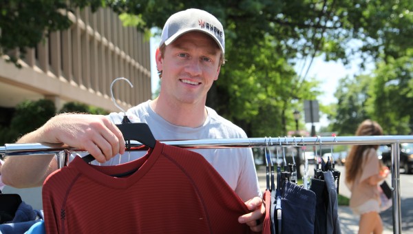 Nate Checketts at a sidewalk sale in Darien. Photo by Danielle Brody