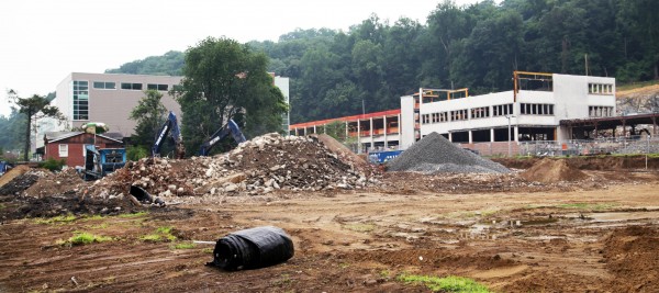 A construction delay leaves a lone demolition crew on the job this month at the Rivertowns Square site in Dobbs Ferry. Photo by John Golden