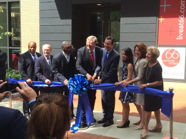 (Center) Gov. Dannel P. Malloy and Stamford Mayor David Martin sharing scissors. Photo by Bill Fallon