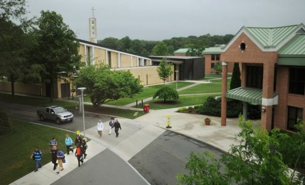 Students walk across the Sacred Heart University campus in Fairfield. Officials have lauded the relationship between the school and town. Photo by Brian A. Pounds