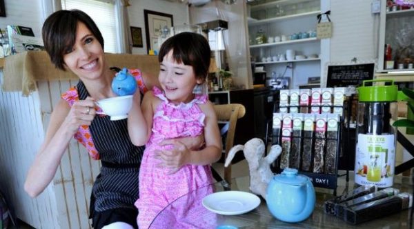 Meredith Mulhearn and her daughter Charlotte, 5, share tea in her Ridgefield shop. Photo by Carol Kaliff